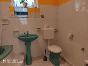 Kúpeľňa v ubytovaní Fox Apartmanok