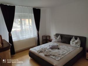 Posteľ alebo postele v izbe v ubytovaní Fox Apartmanok