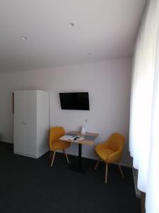 TV a/nebo společenská místnost v ubytování Studio Apartments Merkur