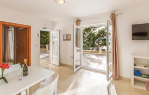 Televízia a/alebo spoločenská miestnosť v ubytovaní Apartments - Villa Sabrina