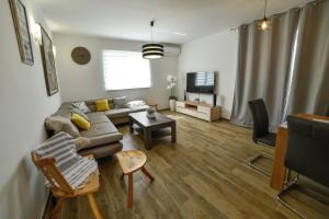 TV a/nebo společenská místnost v ubytování Holiday home MB