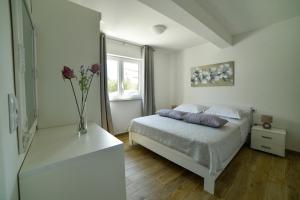 Postel nebo postele na pokoji v ubytování Holiday home MB