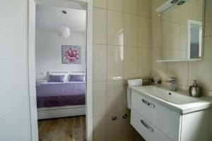 Postel nebo postele na pokoji v ubytování Holiday home MB