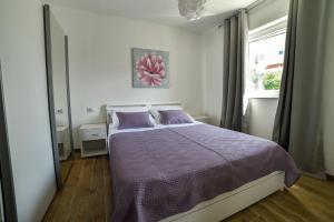 Postel nebo postele na pokoji v ubytování Holiday home MB