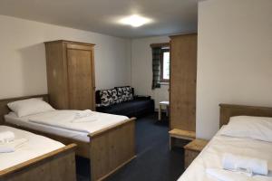 Postel nebo postele na pokoji v ubytování Hotel Alba