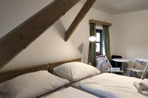 Postel nebo postele na pokoji v ubytování Hotel Alba