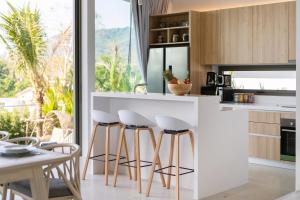 Kuchyň nebo kuchyňský kout v ubytování Himmapana Villas - Terraces - SHA Extra Plus