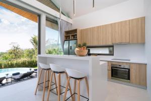 Kuchyň nebo kuchyňský kout v ubytování Himmapana Villas - Terraces - SHA Extra Plus