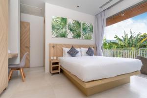 Postel nebo postele na pokoji v ubytování Himmapana Villas - Terraces - SHA Extra Plus