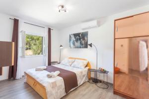 Posteľ alebo postele v izbe v ubytovaní House Arija + 37 fotografií
