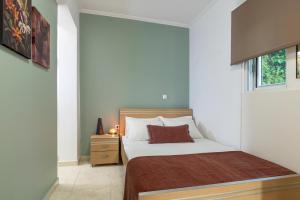 Posteľ alebo postele v izbe v ubytovaní Oasis in the Heart of Rhodes, next to Old Town, near Beaches - Haven Home