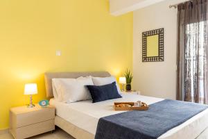 Posteľ alebo postele v izbe v ubytovaní Oasis in the Heart of Rhodes, next to Old Town, near Beaches - Haven Home