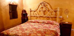 Ένα ή περισσότερα κρεβάτια σε δωμάτιο στο Agriturismo Fiore di Campo +32 φωτογραφίες