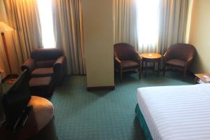 Letto o letti in una camera di Grand Arkenso Park View