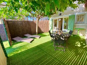 Zahrada ubytování Bastide du Levant - 50m plage - Rez de jardin