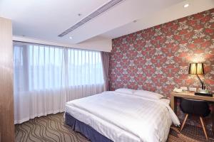 Letto o letti in una camera di RF Hotel - Zhongxiao