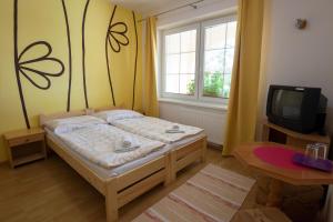 Кровать или кровати в номере Privat Julia