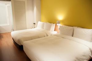 Postel nebo postele na pokoji v ubytování Hotel Park Habio