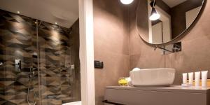 Koupelna v ubytování Duomo Hotel & Apartments
