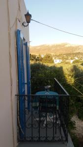 A balcony or terrace at Panormos,Irene's Studio