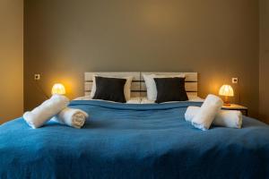 A bed or beds in a room at Hotel Jimla