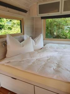 Postel nebo postele na pokoji v ubytování Tiny House Steirerbua