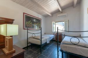 Ένα ή περισσότερα κρεβάτια σε δωμάτιο στο Segni Holiday Home