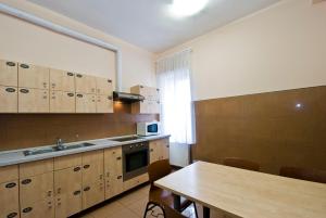 Kuchyň nebo kuchyňský kout v ubytování Hotel Kerpely