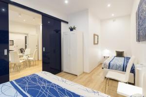 Posteľ alebo postele v izbe v ubytovaní Kazimierz Residence