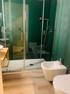 A bathroom at Hotel Conca D'Oro ***S