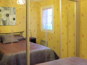 Postelja oz. postelje v sobi nastanitve Ferienhaus Blainville-sur-Mer 401S