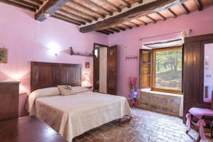 A bed or beds in a room at Villa Rachele