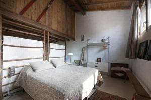 Ein Bett oder Betten in einem Zimmer der Unterkunft Mimosa - terrazzo vista lago