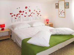 Postel nebo postele na pokoji v ubytování Holiday Home Ada by Interhome