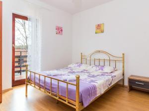 Postel nebo postele na pokoji v ubytování Holiday Home Blanka by Interhome