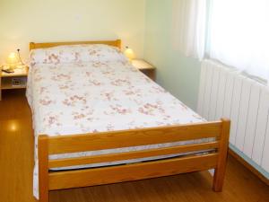 Postel nebo postele na pokoji v ubytování Apartment Smilja by Interhome