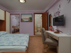 Posteľ alebo postele v izbe v ubytovaní Apartment Jukić-1 by Interhome