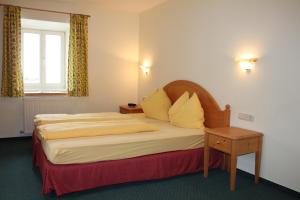 Postel nebo postele na pokoji v ubytování Appartements im Forsthaus + 37 fotografií