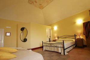 Krevet ili kreveti u jedinici u objektu Palazzo Verone