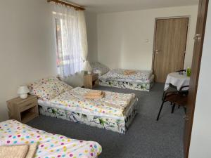 Postel nebo postele na pokoji v ubytování Penzion Dagmar