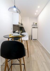 Kuchyňa alebo kuchynka v ubytovaní APARTMAN SOKOL****