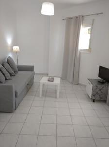 Posezení v ubytování Kavala Home 1