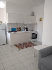 Kuchyň nebo kuchyňský kout v ubytování Kavala Home 1