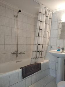 Koupelna v ubytování Kavala Home 1