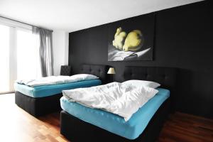 Ein Bett oder Betten in einem Zimmer der Unterkunft Dorya am Ring