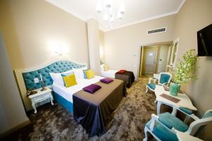 TV a/nebo společenská místnost v ubytování Grand Hotel Traian