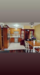 A kitchen or kitchenette at Ático al lado del mar,en las rías baixas