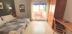 Posteľ alebo postele v izbe v ubytovaní Marinada Cambrils