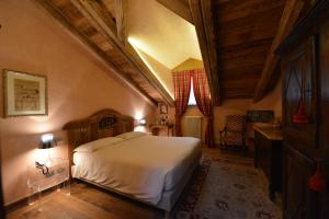 Tempat tidur dalam kamar di Le Reve Charmant