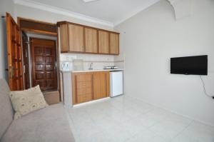 Kuchyň nebo kuchyňský kout v ubytování Defne & Zevkim Hotel